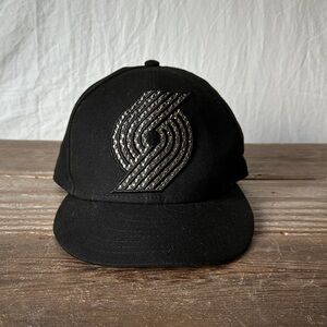 New Era Black Hat with Metallic Logo